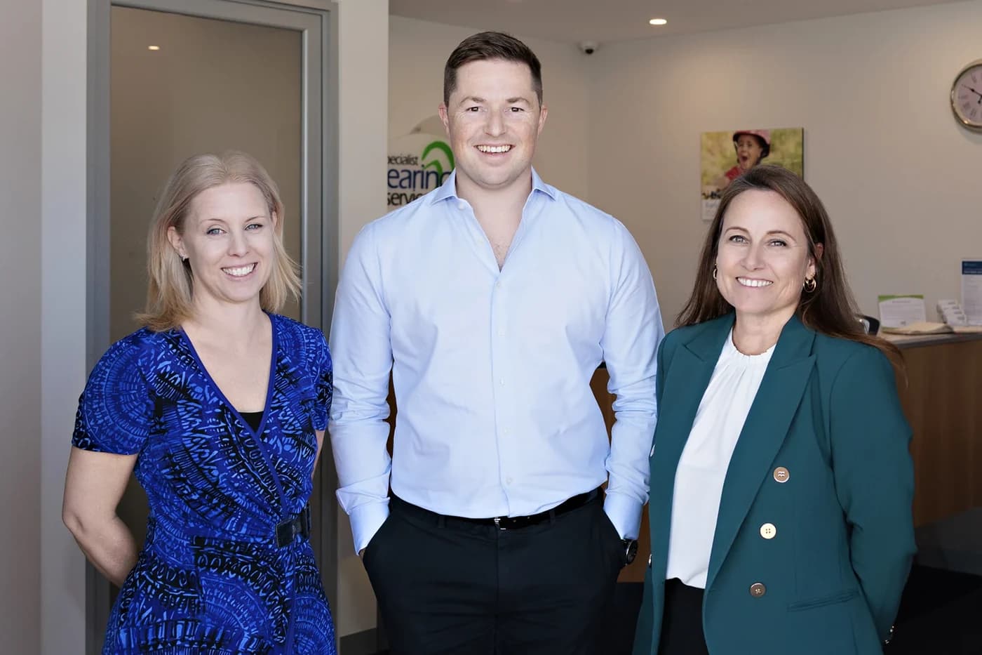 Members of the Specialist Hearing Services team at the clinic reception in Mount Hawthorn.